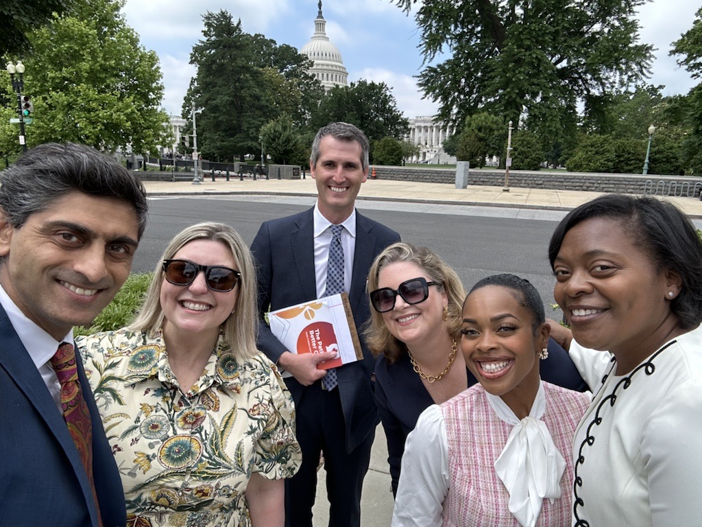 PACH employees taking photo outside of capitol hill